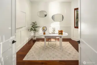Private office on the main with refined finishes—ideal for focused work and quiet productivity.