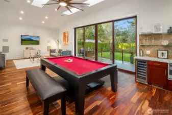 Spacious entertainment lounge with built-in grill and large pool table—designed for unforgettable gatherings.