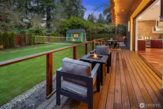 spacious deck—perfect for outdoor lounging and entertaining.