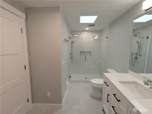 Primary Bathroom with tile flooring