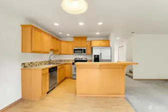 Kitchen features Center Island & Stainless Appliances