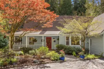 Tucked down a quiet cul-d-sac this home is surrounded by nature on 1.25 acres.