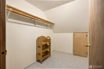 This large storage closet sits off the bonus room above the garage.