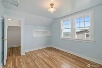 Upstairs Bedroom with Spacious Walk-in Closet and Built-ins