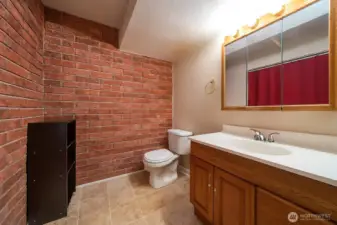 Powder room downstairs.  (Enhanced by Copilot)