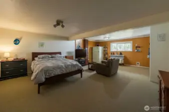 Downstairs rec room or 6th bedroom.  (Enhanced by Copilot)