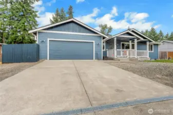 Beautiful Rambler With With Extra Parking, Room For 8 Cars Including Garage!