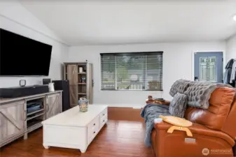 Open Concept Living Area, Lot's of Natural Light and Beautiful Laminate Floors