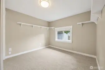 Same room w/out staging. Built in shelves stay!