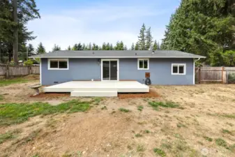 This backyard is perfect for all your gatherings! Freshly painted back deck. Yard has freshly graded soil since new septic system installed after photos were taken. Yard is flat dirt and mulch around deck is gone.