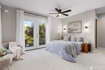 Lowest level bedroom #6; also acts a primary for the ADU with doors to a deck