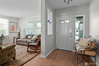 When you enter the home to your right is the formal living and dining room.