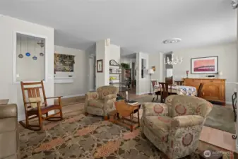 Looking toward hallway and dining space. This open room gives you some options.