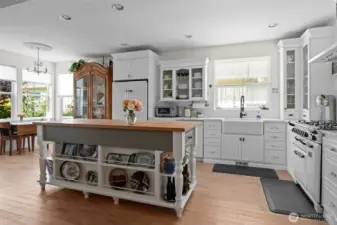 Take a look at the gorgeous kitchen and notice the nook to the left for informal dining.
