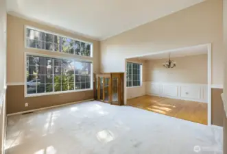 Living room as seen from foyer.  Also showing dining room.