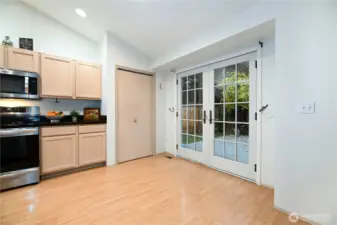 French doors to the rear patio to the private feeling backyard.