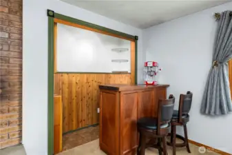 Full wet bar with sink & fridge