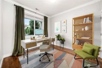 Virtually staged main level den/guest bedroom