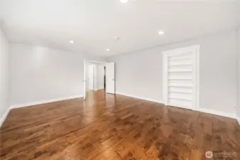 Bonus room with walk-in closet behind bookshelf