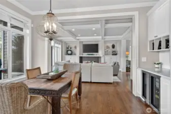 Gourmet kitchen opens into family room & built-in wine bar