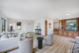 Step into the bright living space with its new LVP flooring and beautiful built-ins.