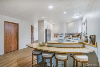 The kitchen peninsula is the center when you entertain your guest.