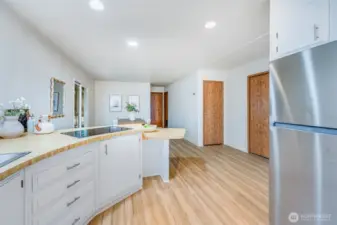 The kitchen flows seamlessly into the rest of the home.