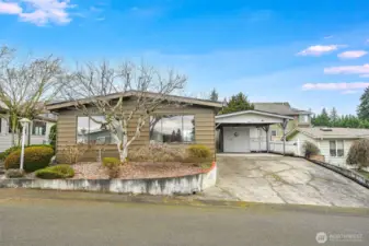 The mature trees frames this home nicely.