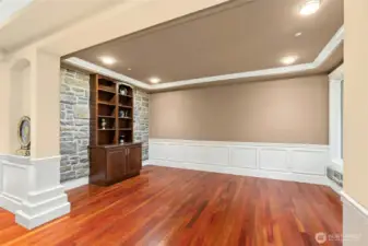 Beautiful formal living room with custom built-in cabinets and shelving, highlighted by detailed millwork craftsmanship.