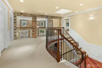 Elegant and expansive second-floor landing enhancing the home’s open architectural design.