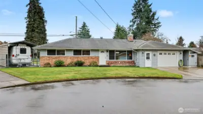 This home offers a huge lot, covered RV parking, storage shed and fully fenced backyard.