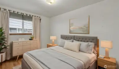 Third bedroom offers hardwood floors (virtually staged).