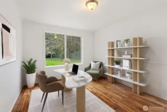 Virtually staged office/den off kitchen and living room