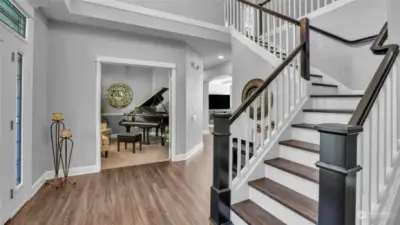 Another view of this gorgeous staircase, peering into the music room/office.