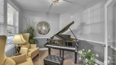 Great sized music room or office with french door entrance and an abundance of natural light.