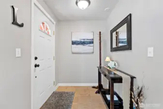 Foyer adjacent to living room.