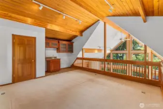 This is the upstairs loft with closet, sink and cabinets.
