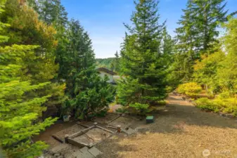 This is the landscaped path leading down from the shop to the home.