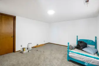 This third bedroom is on the lower level and faces the lake. The door in the photo connects this bedroom with bedroom #4.
