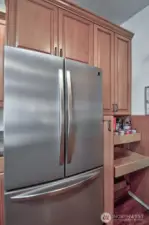 Pantry cabinet has pulls out for easy organization.