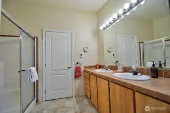 Double sink with lots of counter and cabinet space.