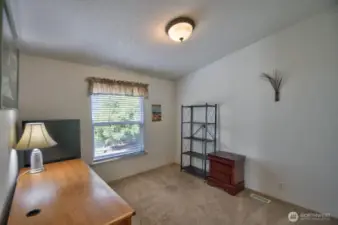 One of the three bedrooms, this one set up as an office.