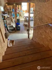 Wide staircase to the bonus room above studio. Very versatile.