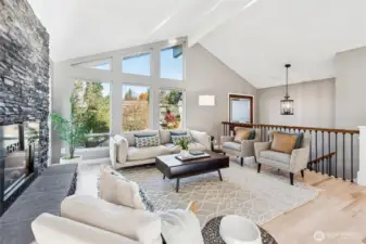 Looking back at the entry, the hardwood flooring flows through the LR, DR, Kitchen, stairs and hallway of the upper floor.