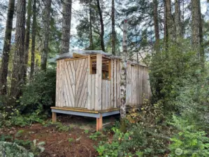 Out building that owner used for building smaller boats