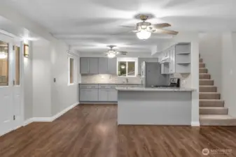 Access to upstairs is off the kitchen