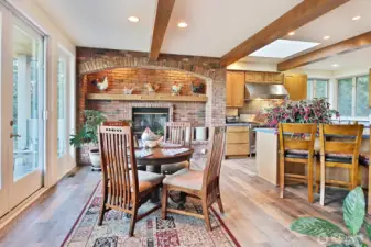 Dining table in kitchen with views to deck