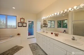 Priary bathroom with large soaking tub & shower