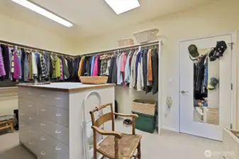 Large walk-in closet with built-ins