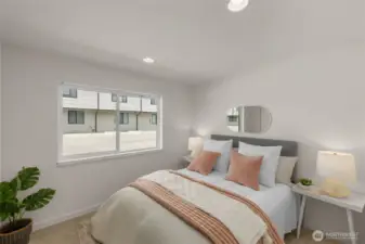 Bright secondary bedroom invites creativity as a serene guest room a personal library or a cozy studio.